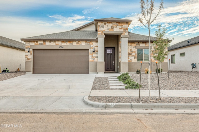 view of front of property featuring a garage