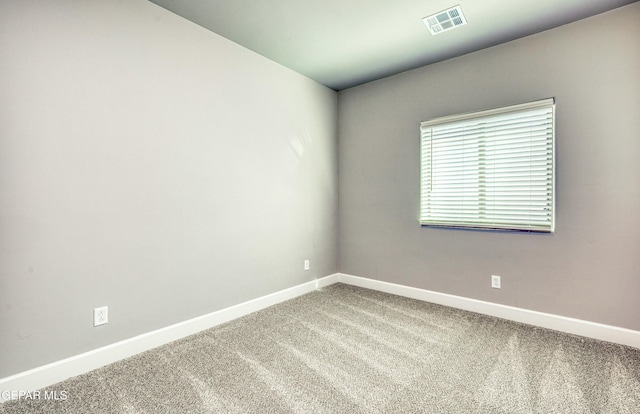 view of carpeted spare room