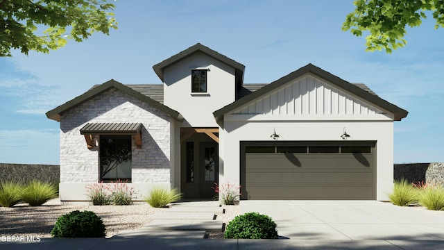 modern farmhouse featuring stone siding, driveway, board and batten siding, and an attached garage