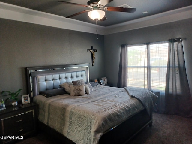 bedroom with dark carpet and ceiling fan