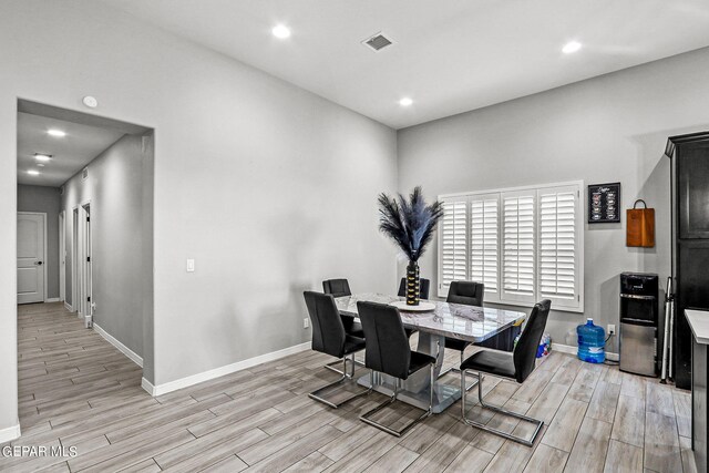 dining room featuring light hardwood / wood-style floors