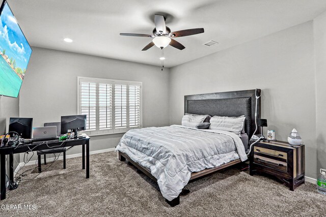 bedroom with ceiling fan and carpet floors