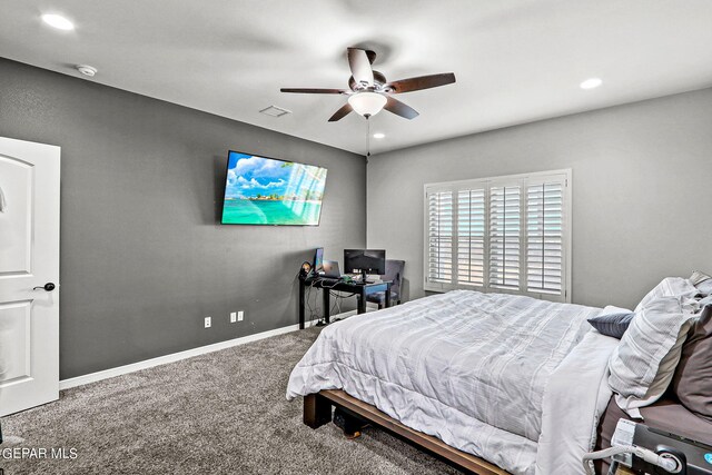 carpeted bedroom with ceiling fan