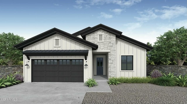 modern farmhouse style home with stone siding, board and batten siding, an attached garage, and driveway