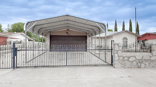 view of gate featuring fence