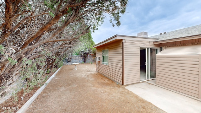 view of property exterior featuring a patio