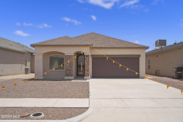 13848 Vicki Brewer Ave, Horizon City, TX 79928 - single story home with an attached garage, driveway, stucco siding, and roof with shingles