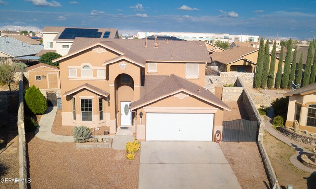 view of front of home with a garage