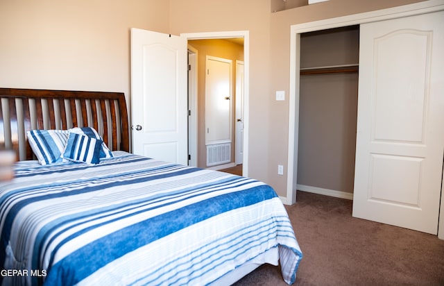 bedroom featuring visible vents, carpet, a closet, and baseboards