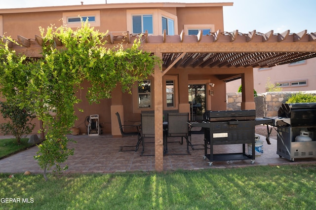 view of patio with outdoor dining space and a pergola