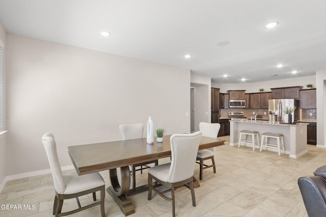 dining room with sink