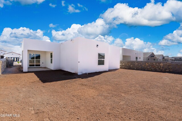 rear view of house featuring a patio area