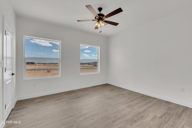 1385 Syrian Desert Dr, Chaparral, NM 88081 - empty room featuring light wood finished floors and ceiling fan