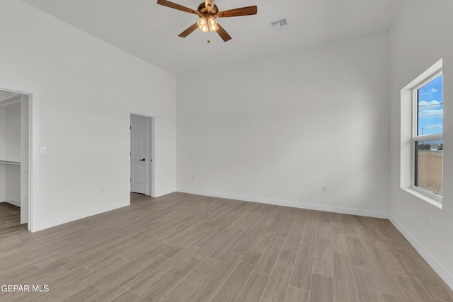 1385 Syrian Desert Dr, Chaparral, NM 88081 - spare room featuring ceiling fan and light wood-style flooring