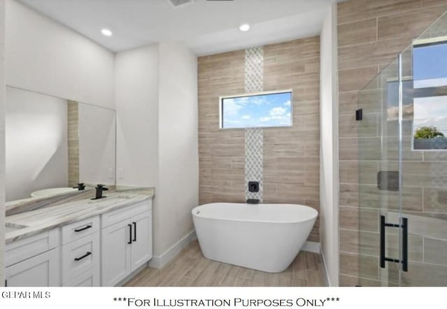 bathroom with separate shower and tub and vanity