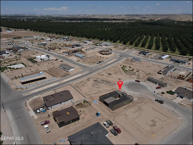 birds eye view of property featuring a rural view