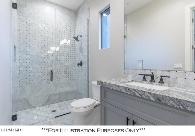 bathroom with vanity, toilet, and an enclosed shower