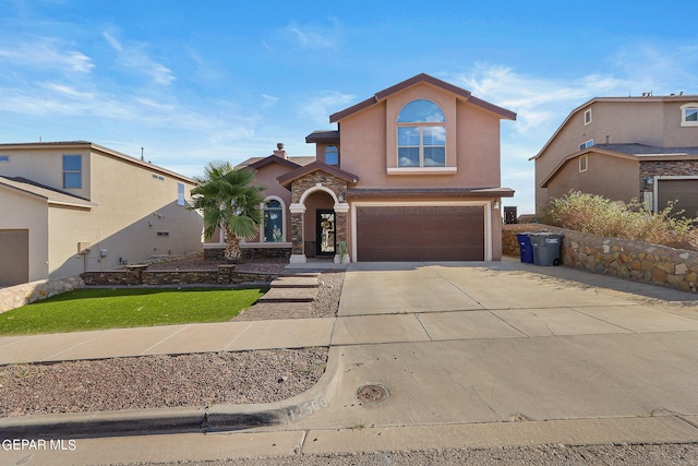 view of front of property featuring a garage