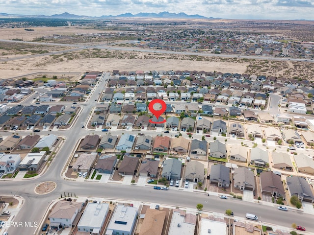 drone / aerial view with a mountain view and a residential view