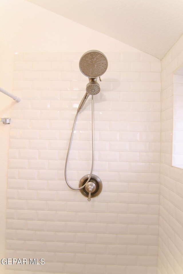 details featuring a tile shower