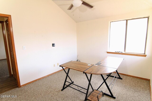 office area featuring lofted ceiling, ceiling fan, and carpet floors