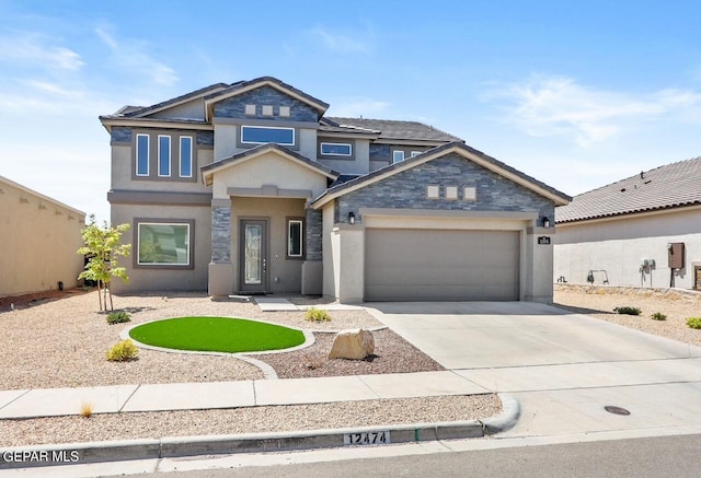 view of front of property featuring a garage