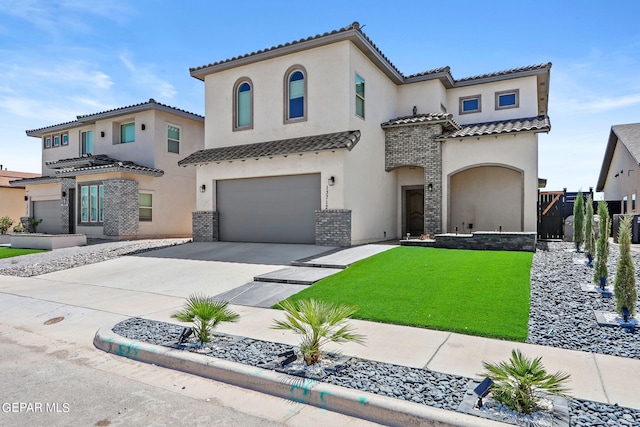 mediterranean / spanish-style home featuring driveway, a garage, brick siding, a front lawn, and stucco siding