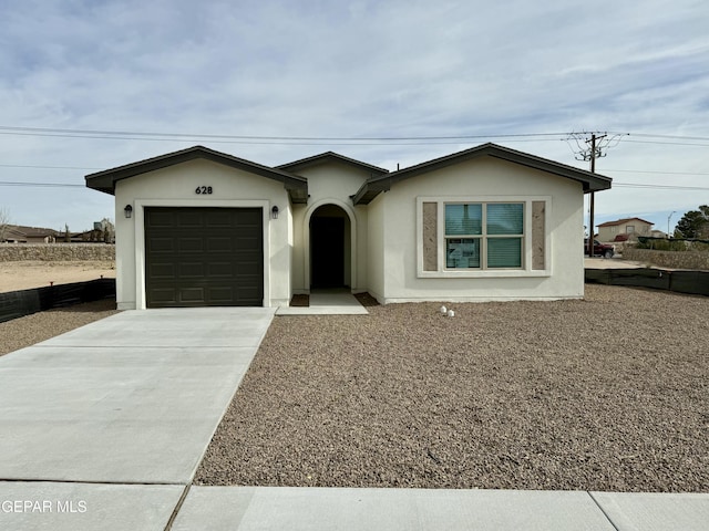 ranch-style home with a garage