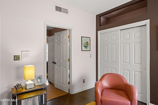 interior space with dark hardwood / wood-style flooring