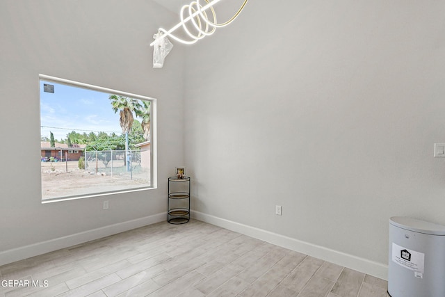 unfurnished room with light hardwood / wood-style floors