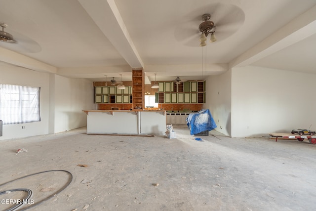 unfurnished living room with ceiling fan