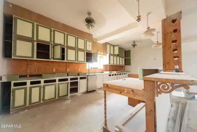 kitchen featuring dishwasher, green cabinets, and decorative light fixtures