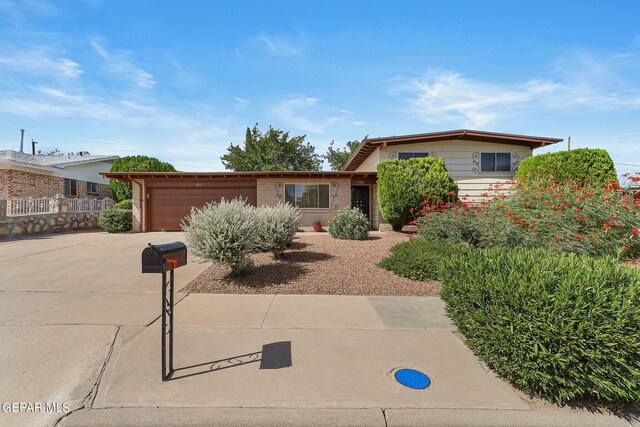 split level home with a garage