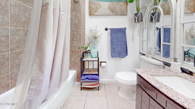 full bathroom with shower / bathtub combination with curtain, tile patterned flooring, toilet, and vanity