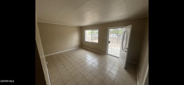 tiled empty room with ornamental molding