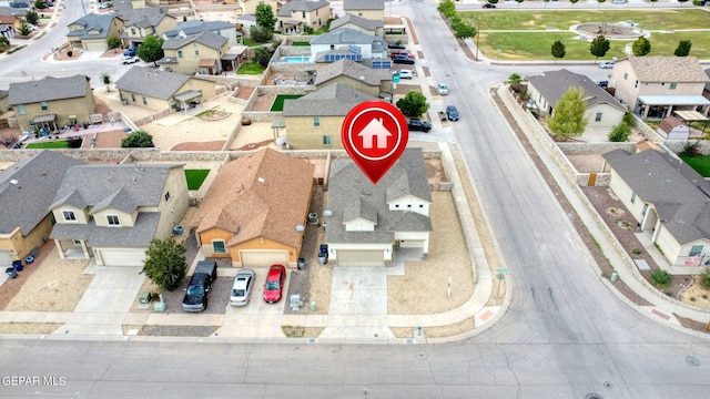 birds eye view of property with a residential view