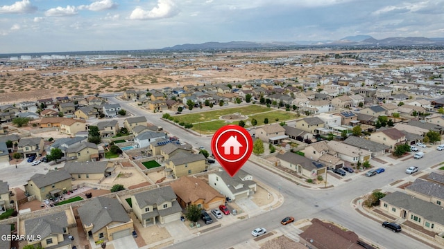 bird's eye view featuring a residential view and a mountain view