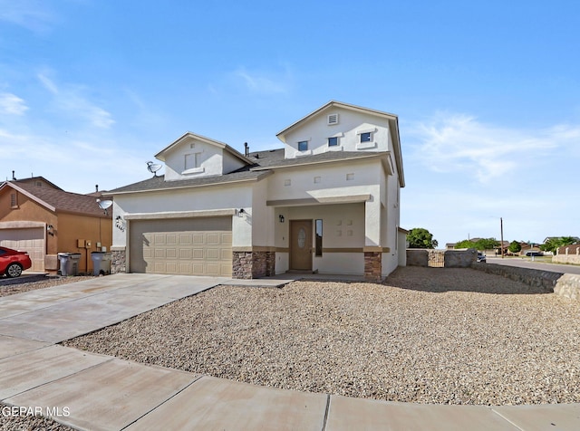 view of front of home featuring concrete driveway, an attached garage, stone siding, and stucco siding