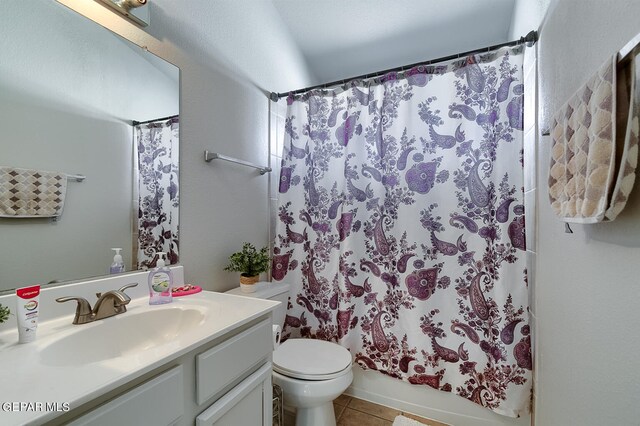 full bathroom featuring vanity, toilet, shower / tub combo, and tile patterned floors