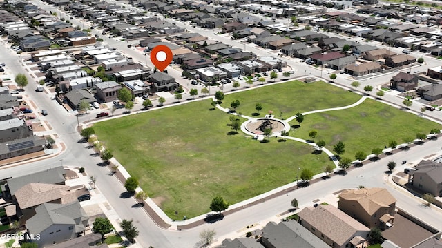 birds eye view of property with a residential view