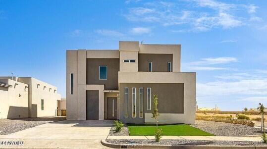 view of front of home featuring stucco siding