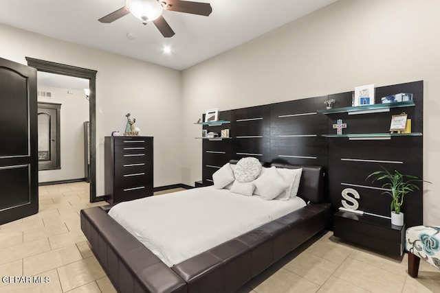 bedroom featuring ceiling fan and light tile patterned floors