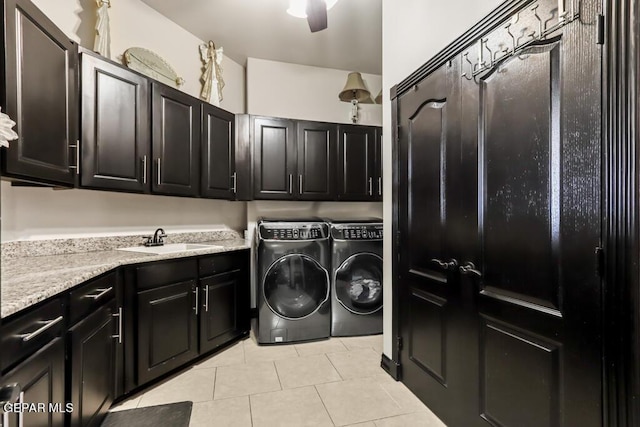 4500 Honey Willow Way, El Paso, TX 79922 - washroom with cabinet space, washer and dryer, and light tile patterned floors