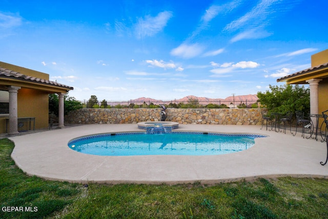 view of pool with a patio area