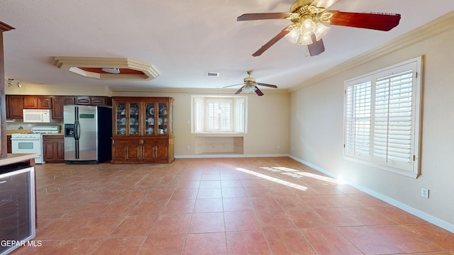 interior space featuring crown molding, light tile patterned floors, beverage cooler, and ceiling fan