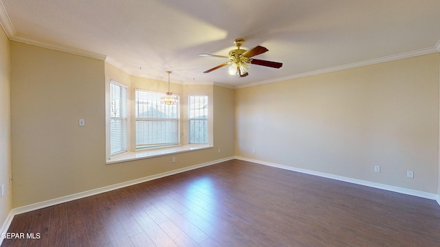 empty room with ceiling fan with notable chandelier, dark hardwood / wood-style floors, and ornamental molding