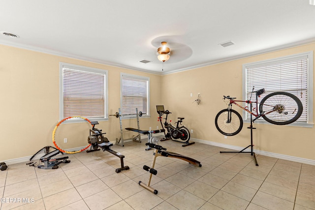 exercise area with tile patterned floors, baseboards, and visible vents