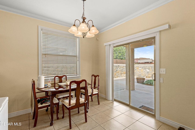 dining space featuring a chandelier, crown molding, baseboards, and light tile patterned flooring