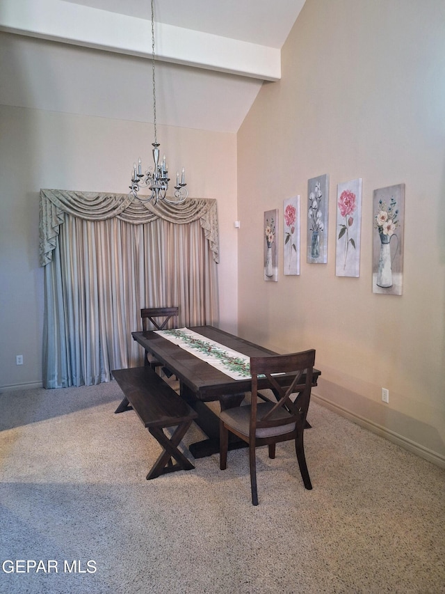 dining area featuring a chandelier, vaulted ceiling with beams, and carpet floors