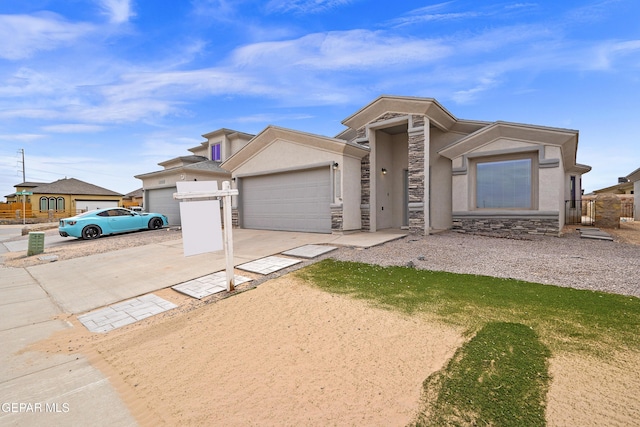 view of front of property featuring an attached garage, stone siding, driveway, and stucco siding